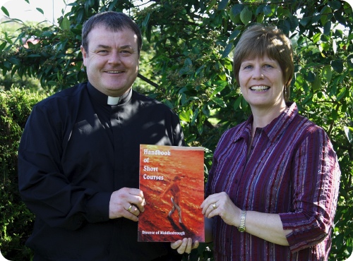 photo of Father John Lumley and Jane Cook at the handbook launch