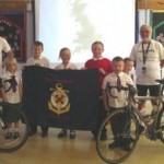 photo of Apostleship of the Sea cyclists with school children