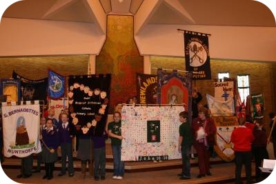 photos of banners at the annual Education Mass