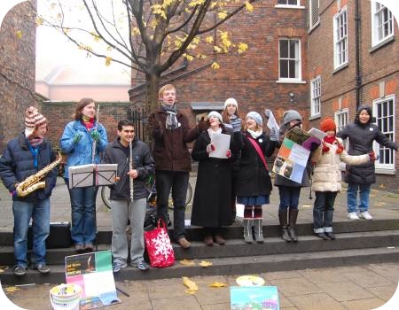 photo of CAFOD supporters busking in York