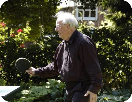 photo of Father Hynes playing table tennis