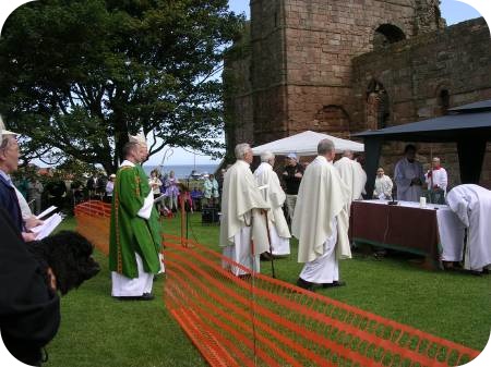 photo of clergy in procession to the altar