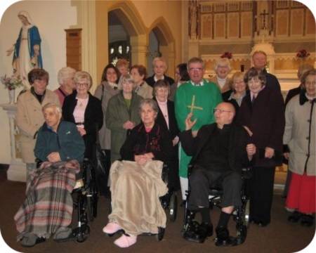 photo of Father Tony Barry and well-wishers