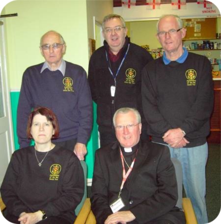 photo of Bishop Terry with AOS workers Dr Sara Baxter, John Wordsworth, Tony McAvoy and Barry Doyle
