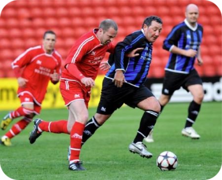photo capturing the action at the Riverside Stadium