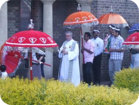 photo of Father Pat Keogh in celebration procession