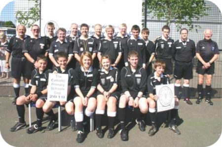 photo of referees including two young lady referees