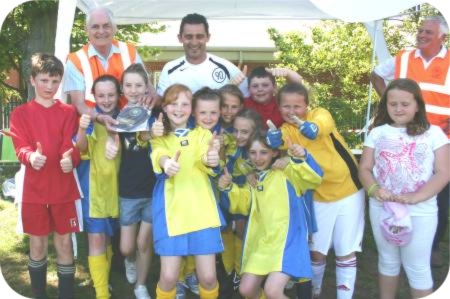 photo of St Joseph's group receiving the Catena Shield for the most original pennant