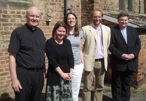 photo of new Church members with Reverend Steele and Father Blenkinsopp