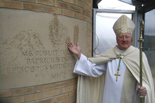 photo of Bishop Terry with newly blessed foundation stone