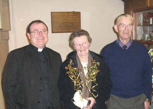 photo of Canon John Loughlin with Maureen and Les Roberts