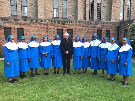 Bishop Terry with the Daughters of Divine Love