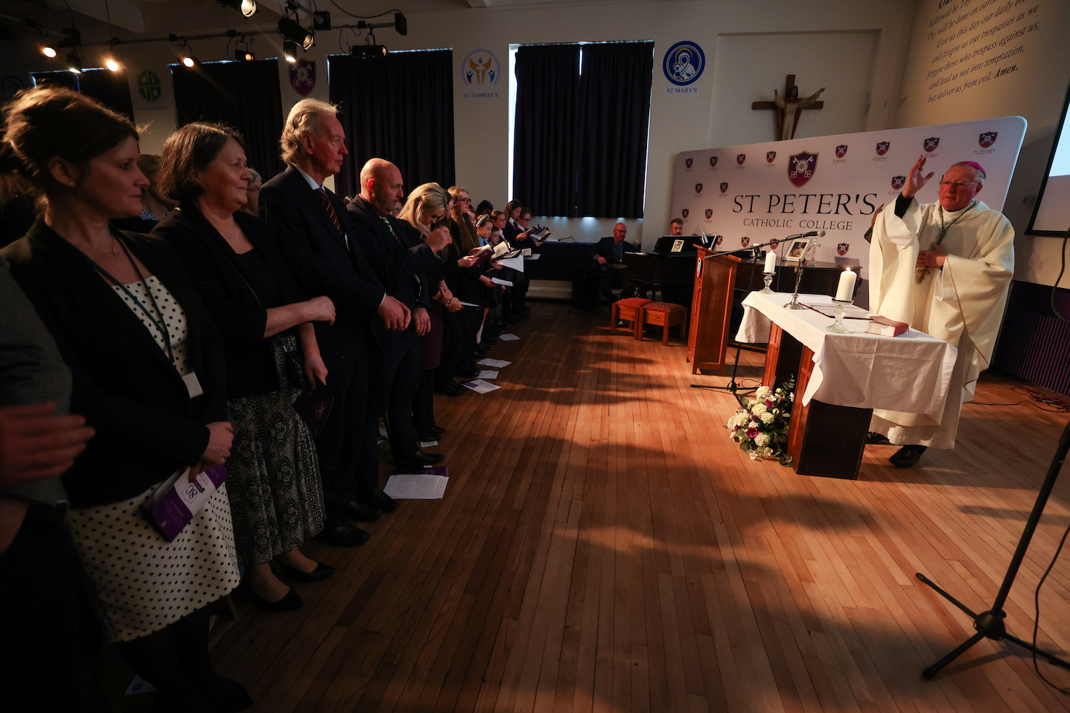 Bishop Terry gives the blessing at the end of Mass during the day of celebrations for St Peter’s Catholic College’s 80th birthday – Photo by Chris Booth