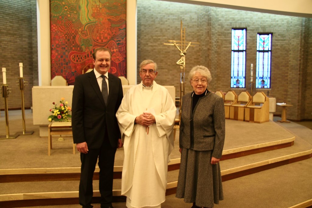 Father David after his ordination, with his wife Diana and son Andrew