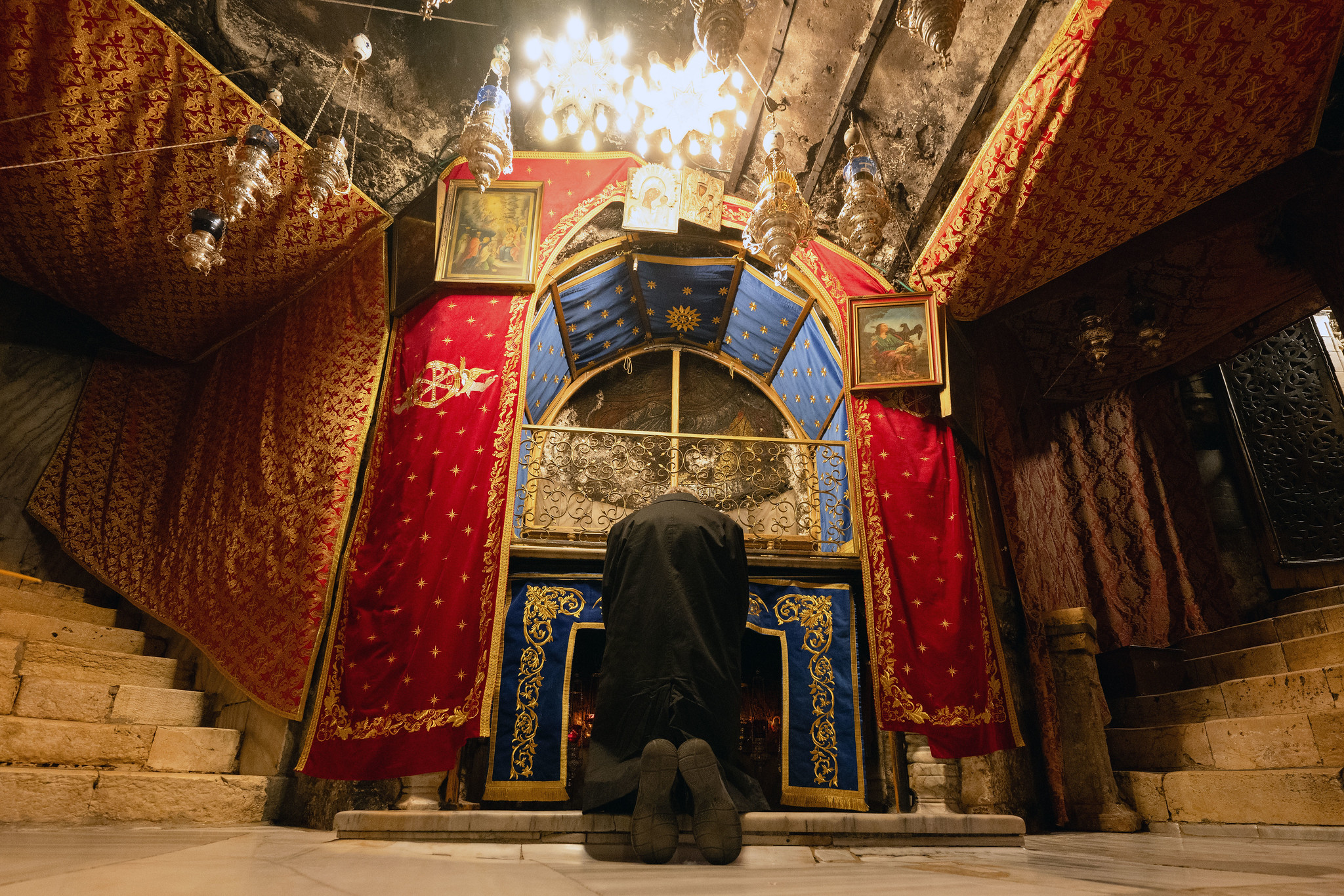 A member of the 2025 Holy Land Coordination party praying at the Grotto of the Nativity – copyright: Mazur/cbcew.org.uk