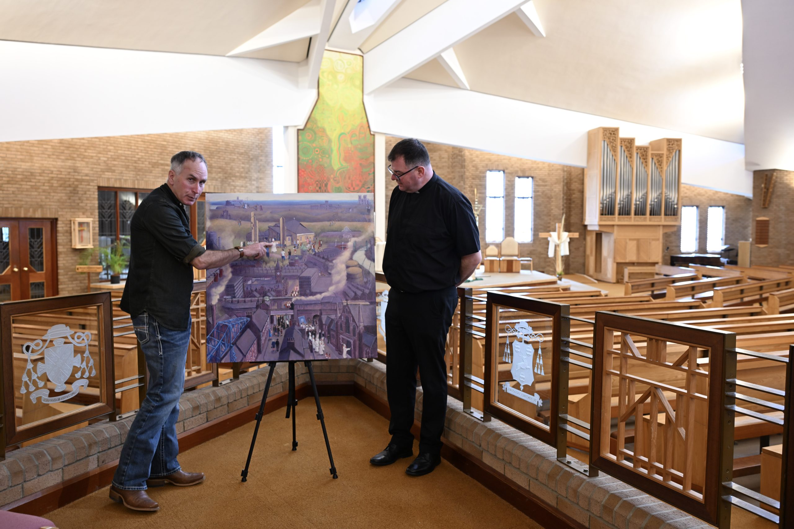 Artist Philip Meadows and Canon Paul Farrer with the painting, Procession – Photo by Ged and Matt O'Connor